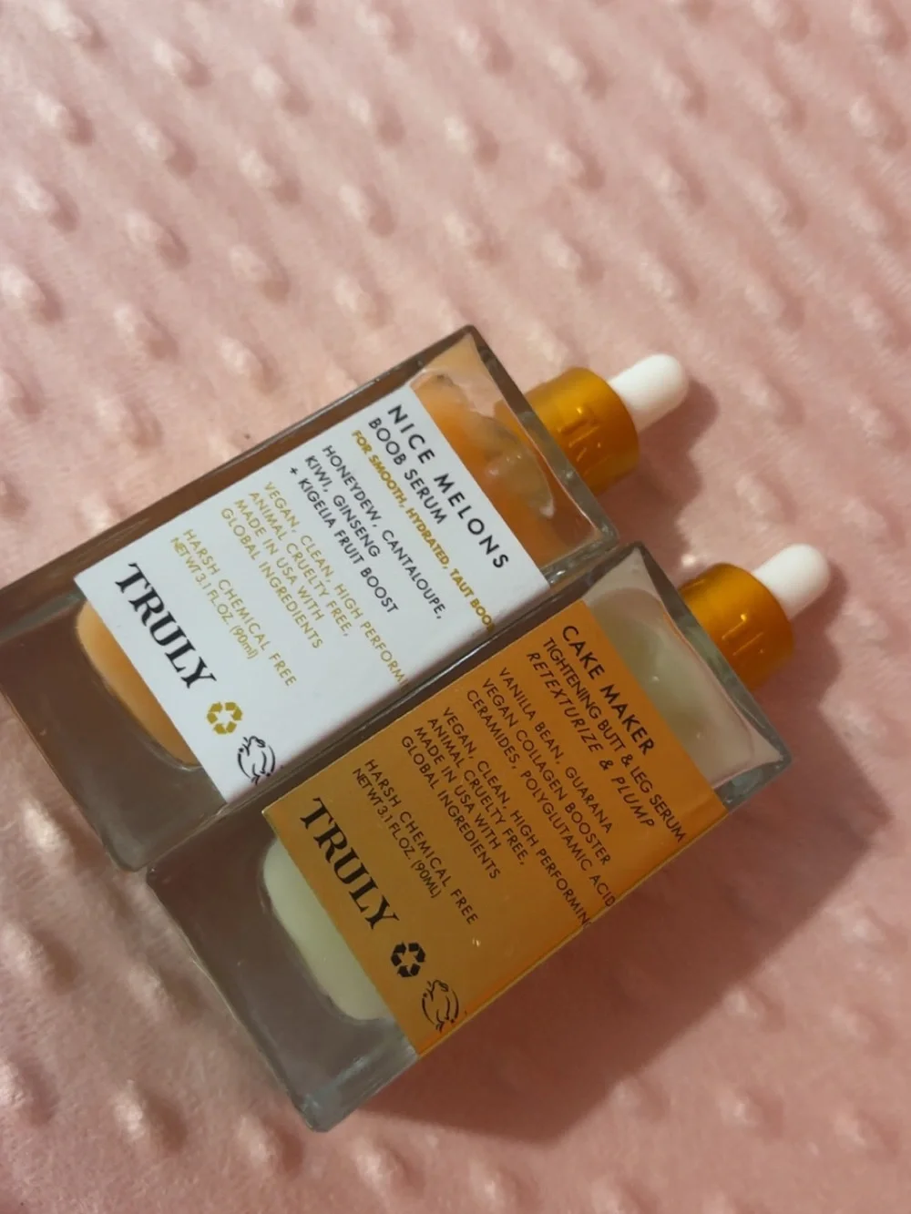 TRULY Brightening Serum Duo in Peach and Gold Dropper Bottles
